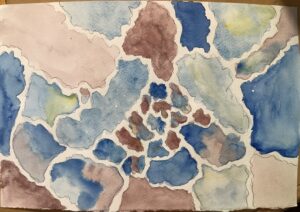 A painting of blue and brown spots on paper.